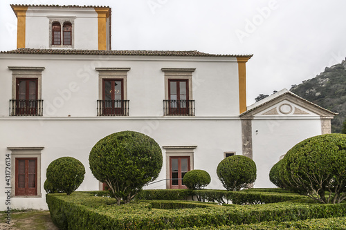 Fragments of typical dwellings in old town of Sintra, Portugal. Sintra is a municipality in Grande Lisboa sub region, delightful Portuguese town that has an abundance of wonderful tourist attractions. photo