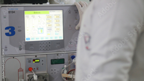 Dialysis machine, control panel of the machine,