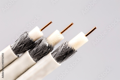 Coaxial tv cable isolated on gray background.