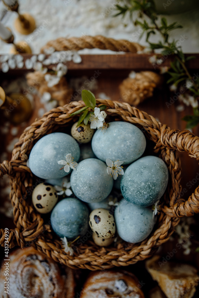 eggs painted blue. Easter eggs top view. chicken and quail eggs in a basket. eggs painted blue. Easter eggs top view. chicken and quail eggs in a basket.