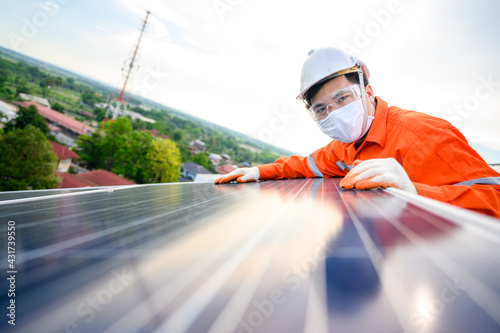 Industrial technician engineers inspect solar panel electricity Working at an industrial plant that installs solar panels using solar energy.