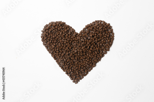 heart shaped cat food isolated on white background