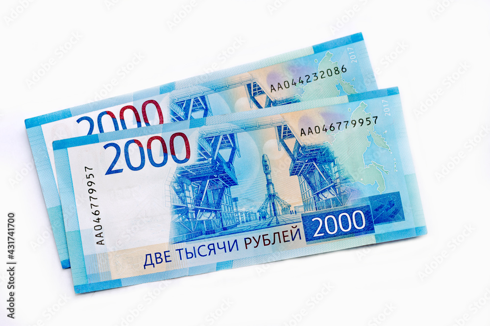 Scattered Russian 2000 rubles banknotes closeup Scattered Russian 2000 rubles banknotes closeup