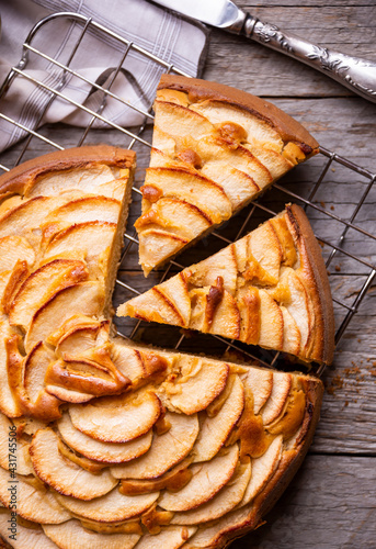 Apple pie, delicious pastry dessert with slices of apple on top photo