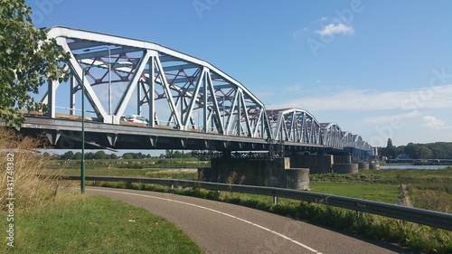 Grave, The Netherlands - September 6, 2020:  John S. Thompson bridge over the Maas in Grave.  Operation Market Garden during the second world war. Memorial site © Maurizio