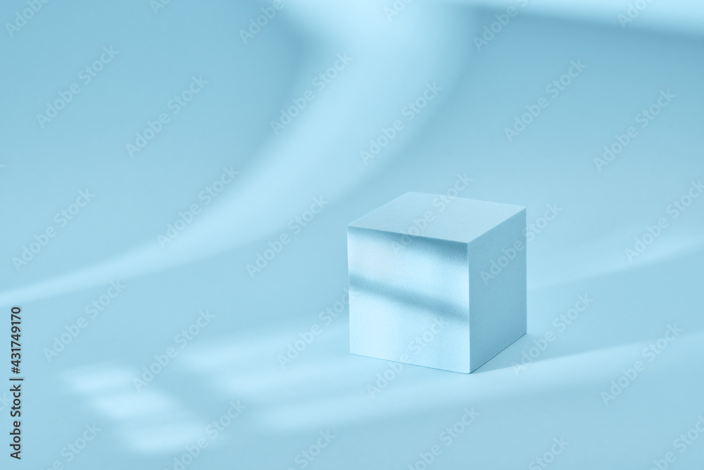 Blue background for product presentation with shadows and light. Empty cubic podium. Mockup.