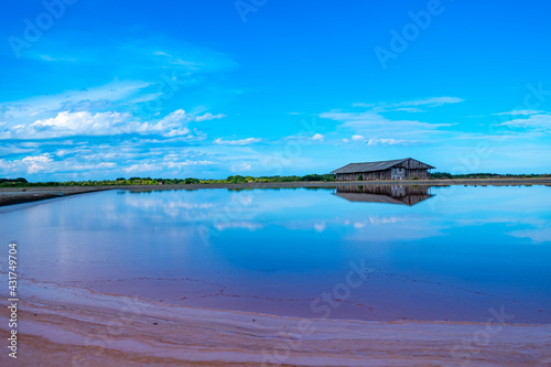 Salt barn with blue sky background in salt fields at Bang Tabun city of Petchaburi province  Thailand