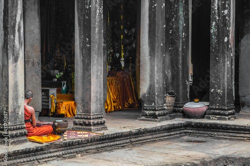 Buddhist Monk in Ancient Temple in Asia