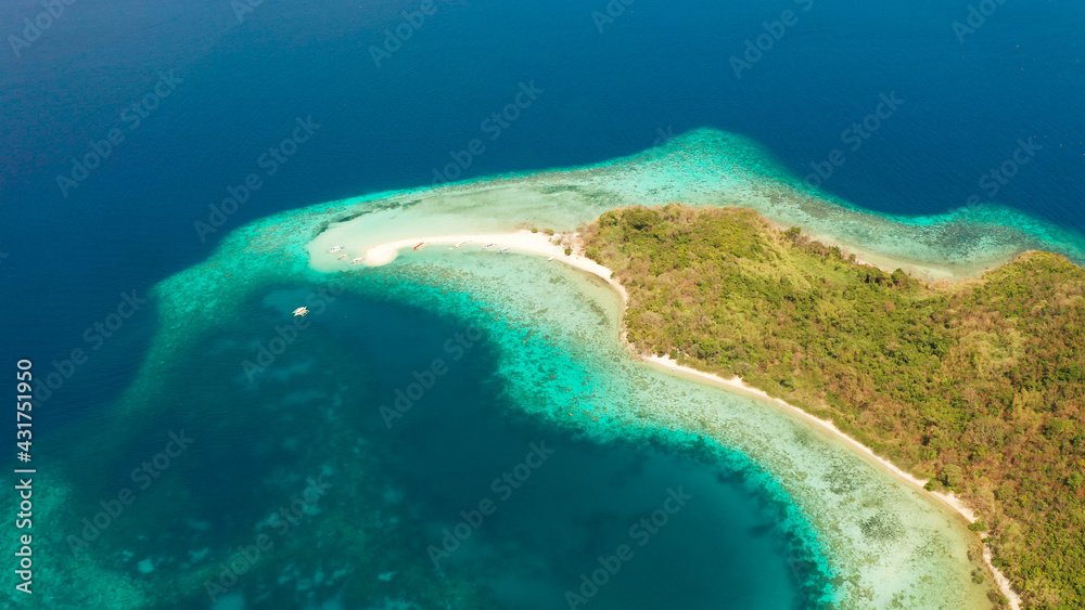 aerial seascape tropical island with sand bar, turquoise water and coral reef. Ditaytayan, Palawan, Philippines. tourist boats on tropical beach. Travel tropical concept. Palawan, Philippines