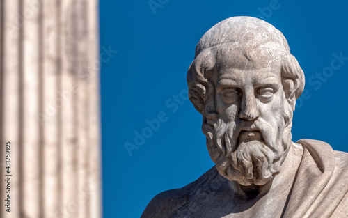 Plato, the ancient Greek philosopher and thinker on blue sky background, space for your text. photo