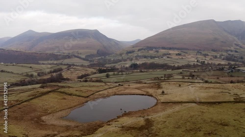 Aerial view of Tewet Tarn overlooking Blencathra in the Lake District. photo