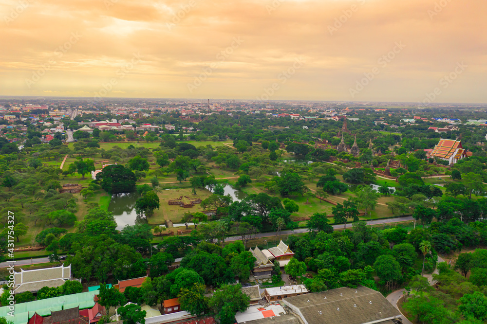 Fototapeta premium Aerial of Ayutthaya historical park located in Ayutthaya province , Thailand. Ayutthaya Historical Park is a historic site that has been registered as a World Heritage Site.
