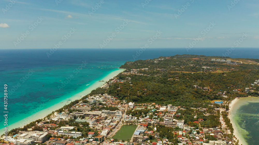 Costline of the tropical island of Boracay with sandy beaches and hotels from above. Summer and travel vacation concept. Philippines.