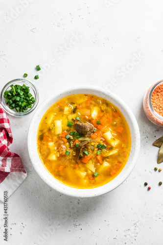 Carrot red lentil soup. Top vview, copy space.