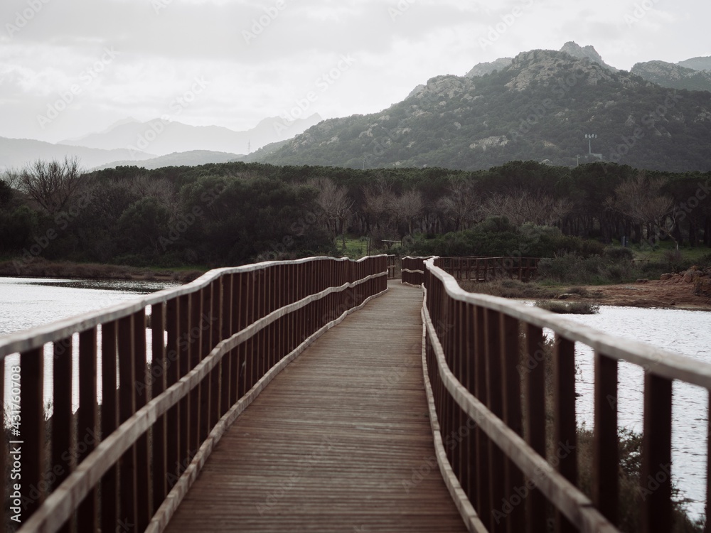 Wooden bridge over the lake in Sardinia