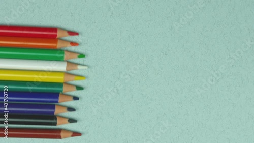 School accessories, pencils on magenta background. Back to school. Top view, copy space
