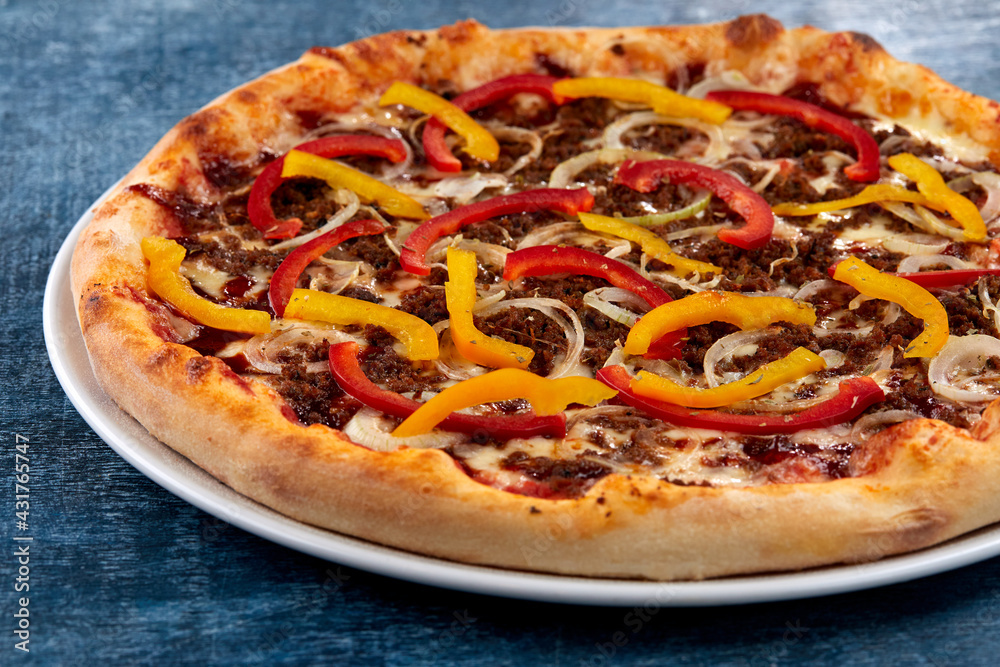 fresh pizza on the white plate