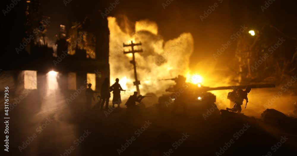 War Concept. Military silhouettes fighting scene on war fog sky background, World War Soldiers Silhouette Below Cloudy Skyline At night. Battle in ruined city. Selective focus