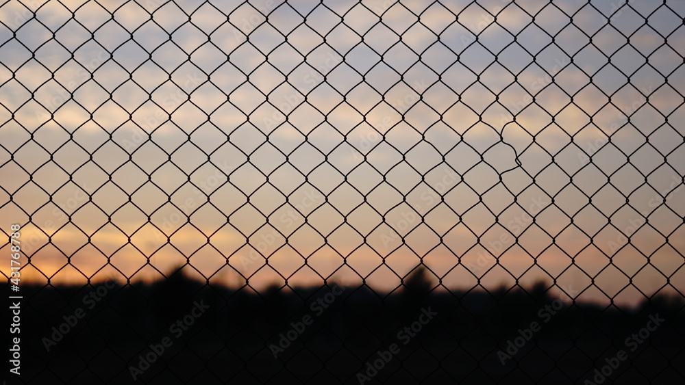 sunset sky through a grate sunset sky through a grate