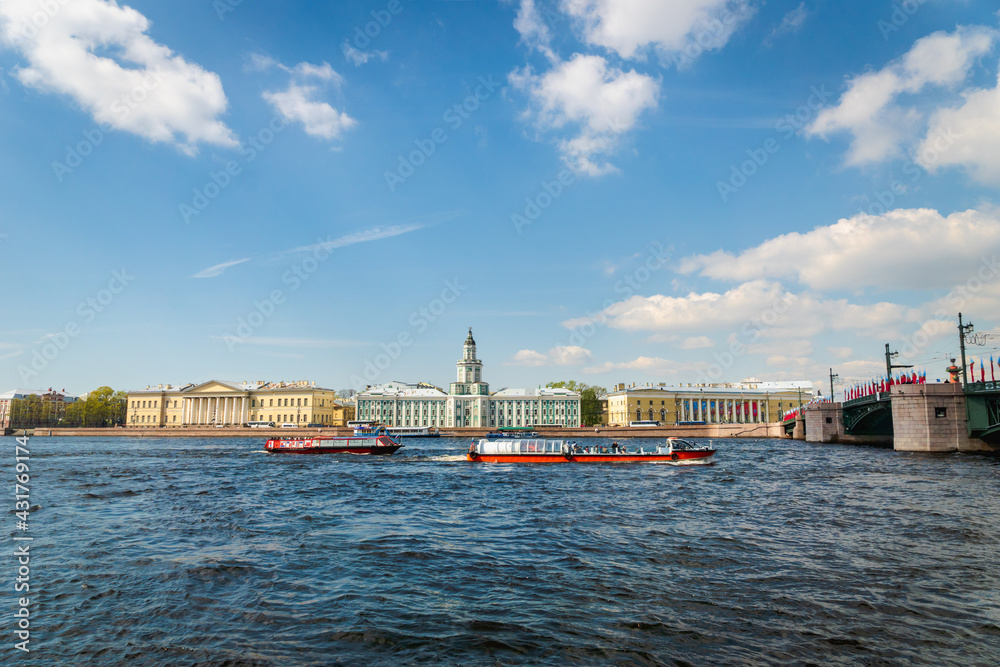 Saint Petersburg, Russia - May 2019:  Saint Petersburg river view of Neva river, boats and architecture cityscape