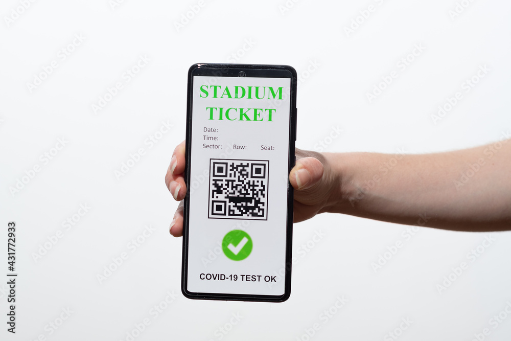 vaccinated person using digital health passport app in mobile phone to show stadium ticket