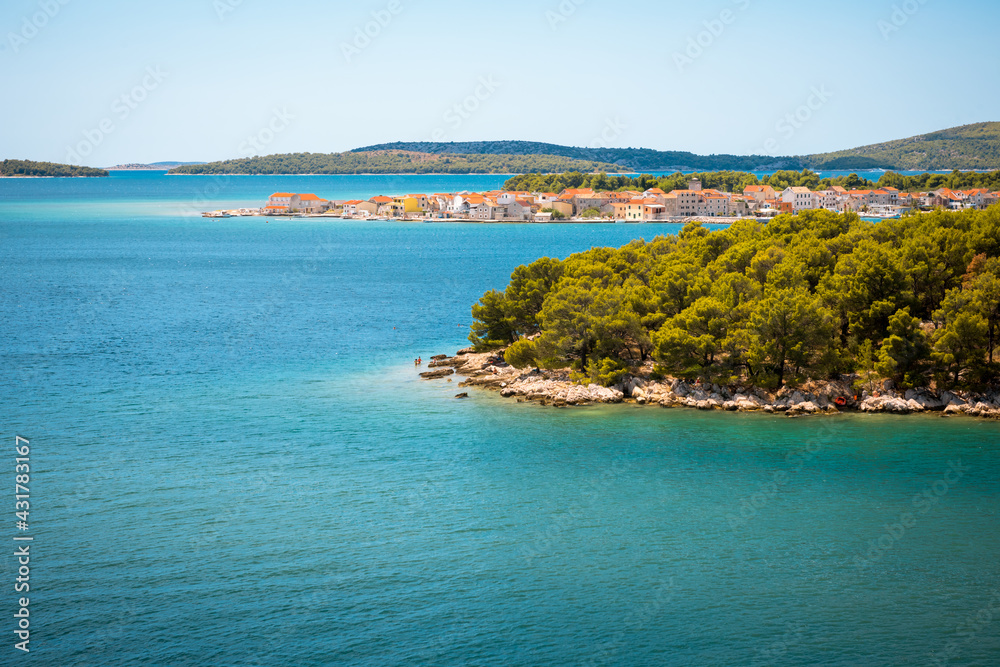 Sunny shore of the Adriatic sea near Brodarica coastline, Croatia