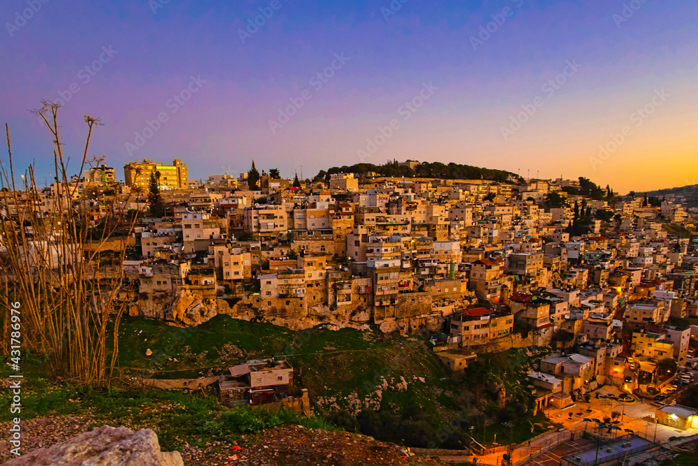 Old city. East quarter. Muslim Quarter, panoramic top view at blue hour at sunset.