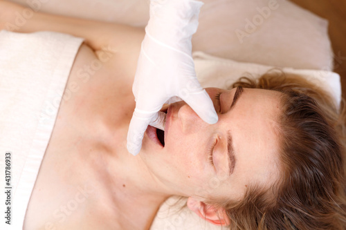buccal massage. cheek massage from the inside out