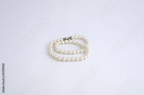 A beautiful pearl bracelet on white background.