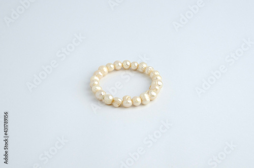 A beautiful pearl bracelet on white background.