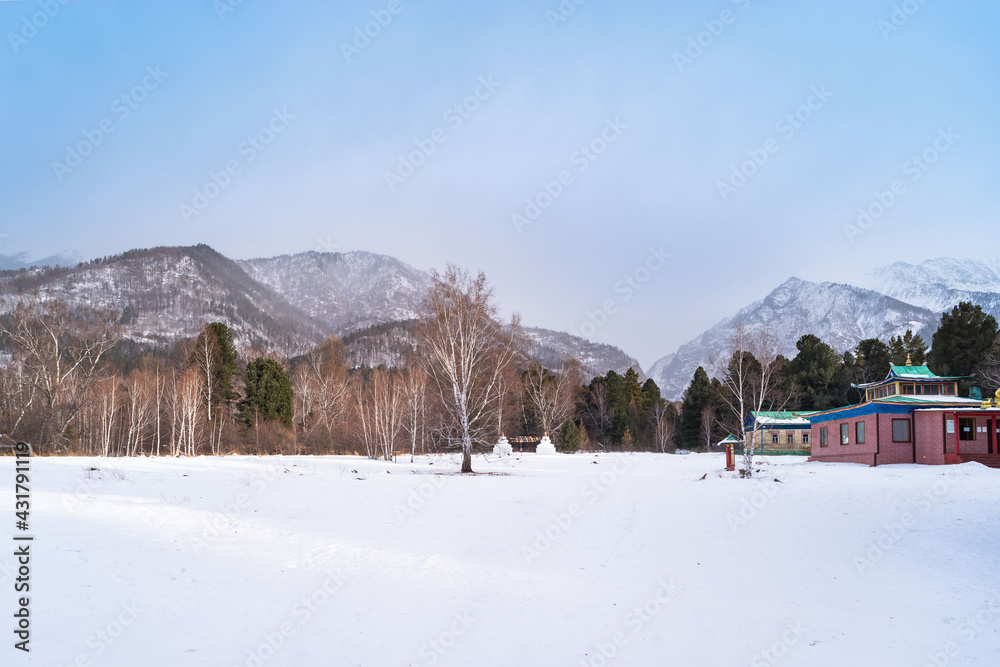 Arshan village in winter time. Foothills of the Eastern Sayan Mountains, Tunka valley. Buryatia, Est Siberia, Russia Arshan village in winter time. Foothills of the Eastern Sayan Mountains, Tunka valley. Buryatia, Est Siberia, Russia