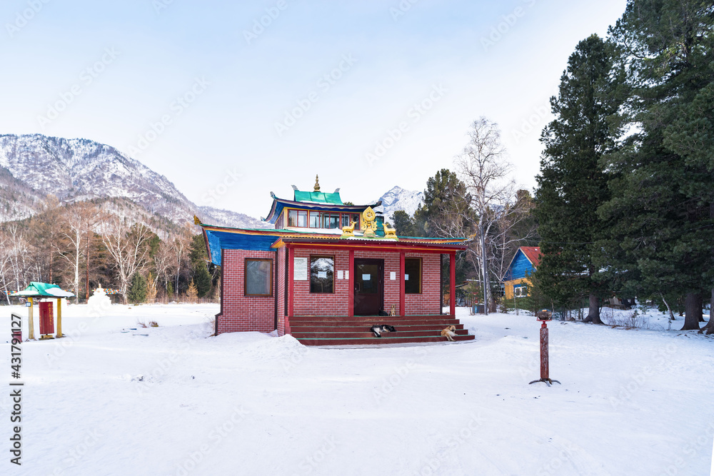 Naklejka premium Arshan village in winter time. Foothills of the Eastern Sayan Mountains, Tunka valley. Buryatia, Est Siberia, Russia