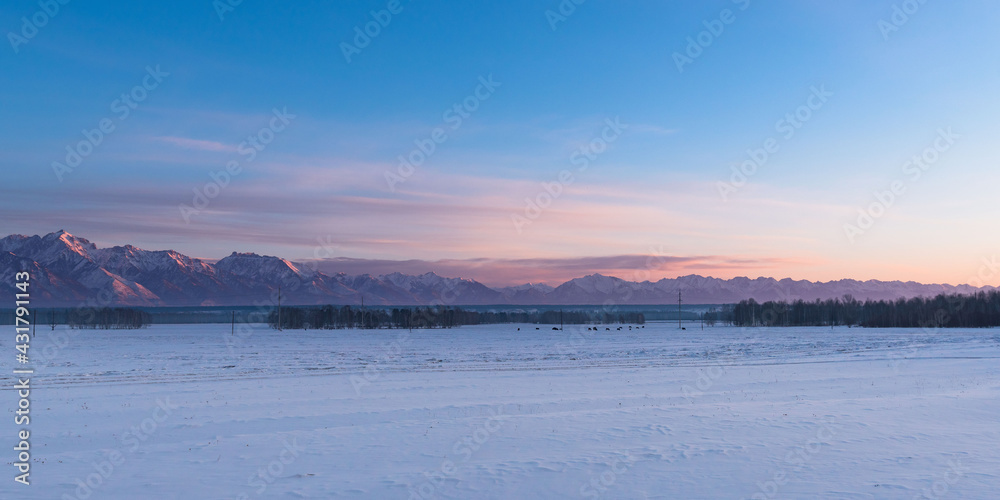 The reserved Tunkinskaya valley on a sunrise in early spring. Republic of Buryatia, Russia, Siberia
