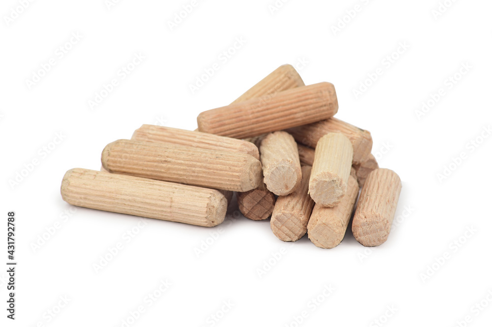 Wooden dowels for fixing cabinet furniture, folded in a slide Wooden dowels for fixing cabinet furniture, folded in a slide