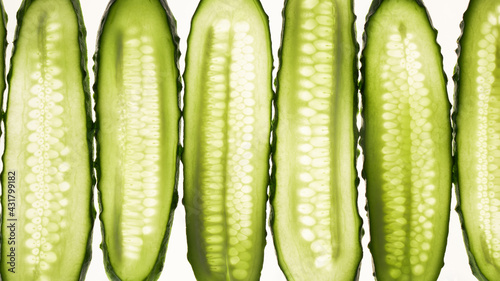 Valokuva Cucumber green slices pattern isolated on white background