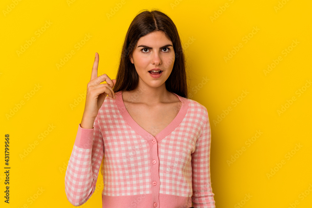 Young caucasian woman isolated on yellow background having an idea, inspiration concept. Young caucasian woman isolated on yellow background having an idea, inspiration concept.
