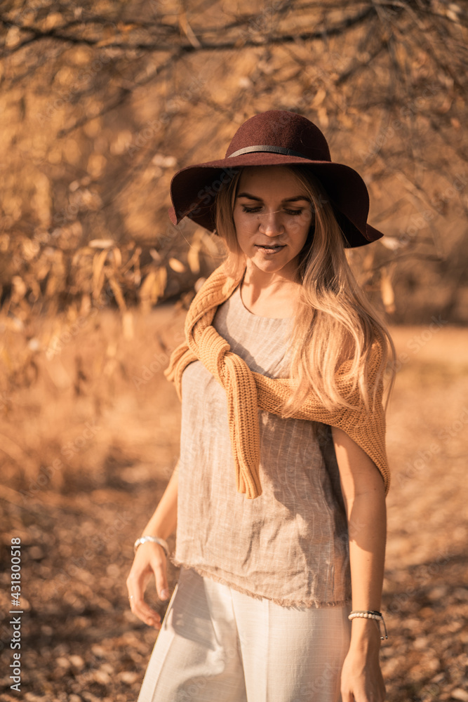 Obraz premium A beautiful young girl. Portrait in the forest