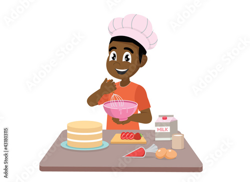 Little African boy cooking making a cake 