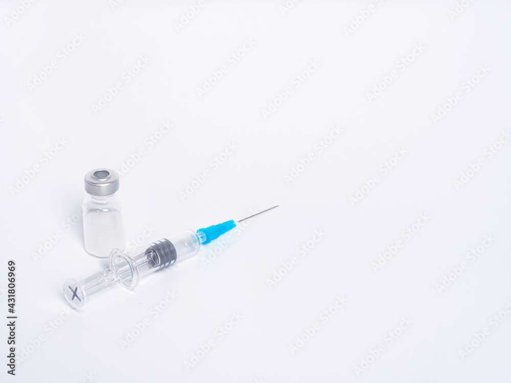 Vaccine vial with syringe isolated. White background. Concept vaccination. Vaccine vial with syringe isolated. White background. Concept vaccination.