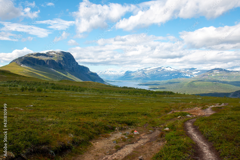 Hiking Kungsleden trail from Saltoluokta to Kvikkjokk in summer, Swedish Lapland.
