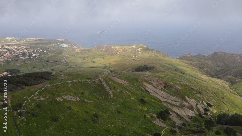 Porto Santo is a Portuguese island 43 kilometres northeast of Madeira Island in the North Atlantic Ocean. Porto Santo is a Portuguese island 43 kilometres northeast of Madeira Island in the North Atlantic Ocean.