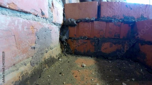 Wallpaper Mural Bricklayer builds a brick oven. 4K. Torontodigital.ca