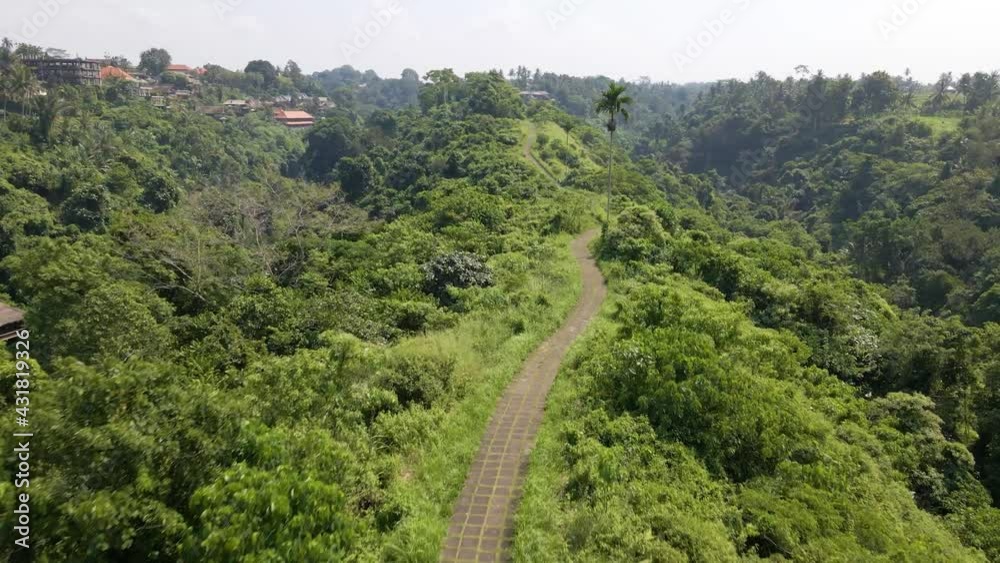 Aerial Drone 4K Follow Shot of Hidden Pathway on Top of a Mountain Cliff Surrounded by a Village in Asia Aerial Drone 4K Follow Shot of Hidden Pathway on Top of a Mountain Cliff Surrounded by a Village in Asia