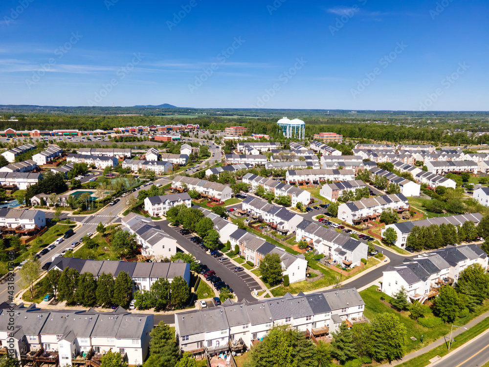Aerial view of residential houses at summer. American neighborhood,
