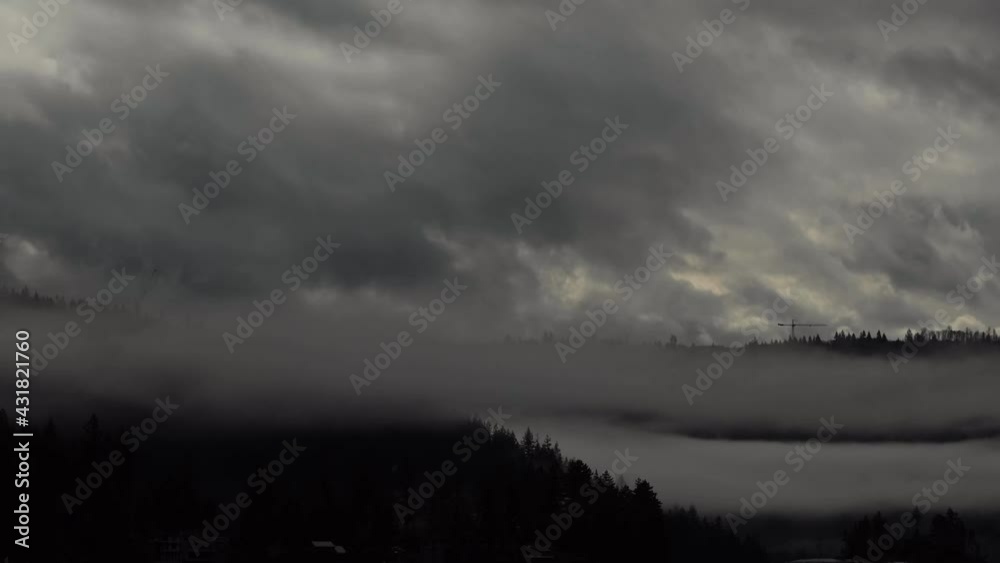 Time lapse of clouds and fog rolling over a valley in British Columbia, Canada. Time lapse of clouds and fog rolling over a valley in British Columbia, Canada.