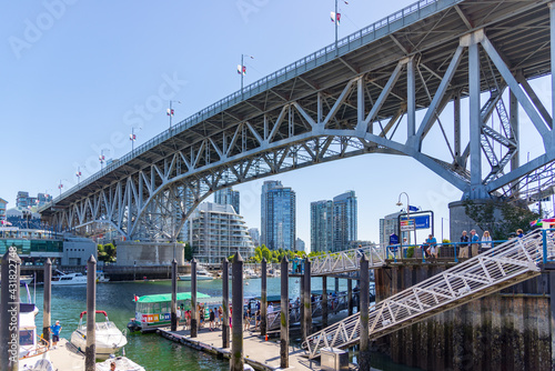 Vancouver, BC / Canada 06/15/2015 Granville Island Bridge perspective view on a summers day photo