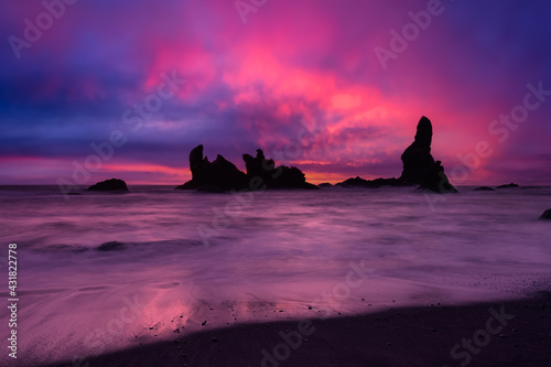 View of a scenic landscape at the Ocean Coast. Taken at Shi Shi Beach in Neah Bay, West of Seattle, Washington, United States of America. Colorful Sky Art Render photo