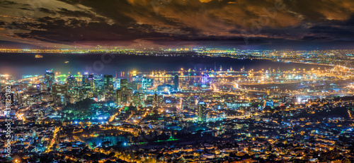 Cape Town city and working harbor at night time, South Africa