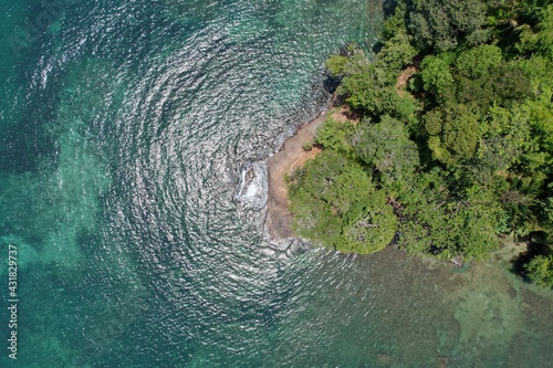 Lush tropical Caribbean Coast of Limon in Costa Rica -aerial views of Cocles, Punta Uva, Playa Chiquita and Puerto Viejo photo