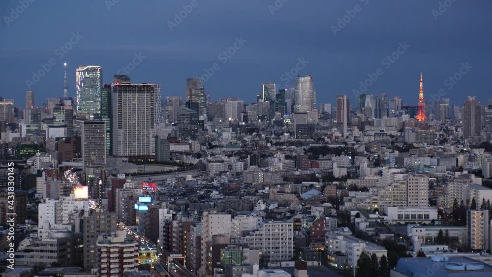 TOKYO, JAPAN : Aerial high angle view of CITYSCAPE of TOKYO at night. View of busy central downtown area (Shibuya and Roppongi). Japanese urban metropolis and nightlife concept. Real time shot. TOKYO, JAPAN : Aerial high angle view of CITYSCAPE of TOKYO at night. View of busy central downtown area (Shibuya and Roppongi). Japanese urban metropolis and nightlife concept. Real time shot.